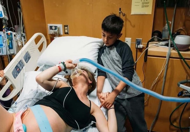 9-Year-Old Son Supports Mother During Labor